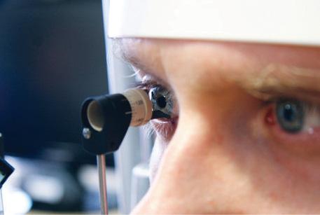 Figure 1. ToMark corneal marker placed on tonometer apparatus being used to make marks at the desired meridian.